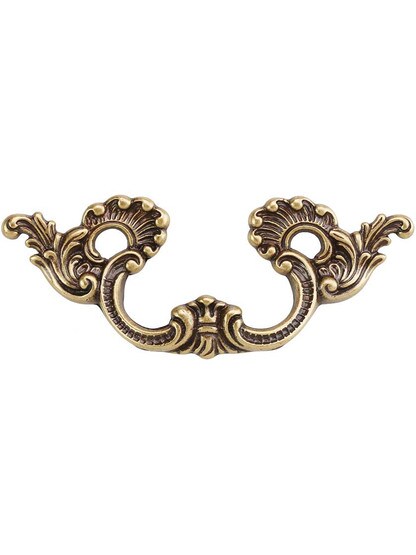 Medium Rococo Pull - 2.52 inch Center-to-Center in Antique Brass Dark.